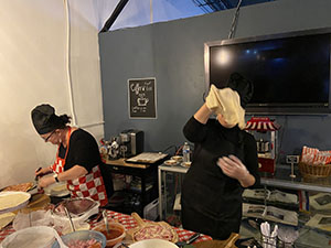 The image from croatian coffee bar Nase malo misto - preparing pizza